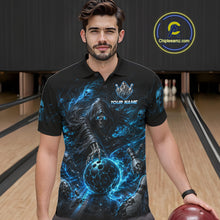Load image into Gallery viewer, Man wearing a black polo shirt with a blue graphic design in a bowling alley.