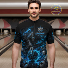 Load image into Gallery viewer, Man wearing a black and blue bowling shirt with a design and text in a bowling alley.