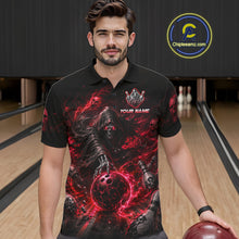 Load image into Gallery viewer, Man wearing a black polo shirt with a red and black design in a bowling alley.