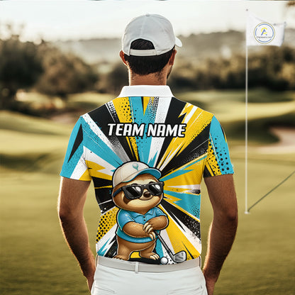 A man viewed from behind wearing a custom short-sleeve golf shirt with a colorful graphic print featuring a sloth wearing sunglasses and a golf cap, set against a blurred golf course background. The shirt has a yellow, blue, black, and white sunburst pattern with 'TEAM NAME' printed on the back.