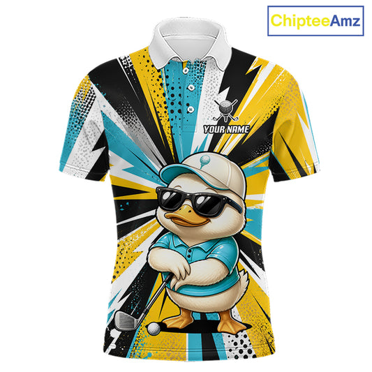 A short-sleeve polo shirt with a colorful abstract yellow, blue, black, and white burst pattern, featuring a cartoon duck wearing sunglasses and a cap, a golf club, and a golf ball. The shirt has a white collar and mock buttons at the neck.