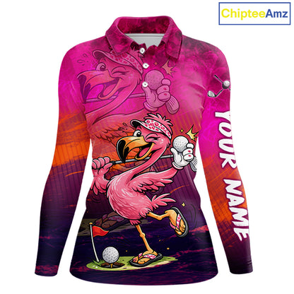 A long-sleeve collared polo shirt with a vibrant pink flamingo golf graphic, featuring a cartoon flamingo hole-in-one scene, a large flamingo face on the chest, and 'YOUR NAME' printed down the right sleeve. The shirt has a pink-to-purple gradient design with orange sunset accents.