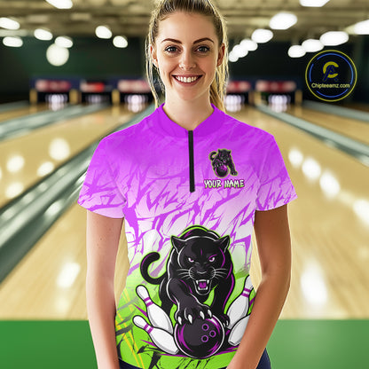 Bowler wearing custom orange and blue leopard bowling shirt on the lanes