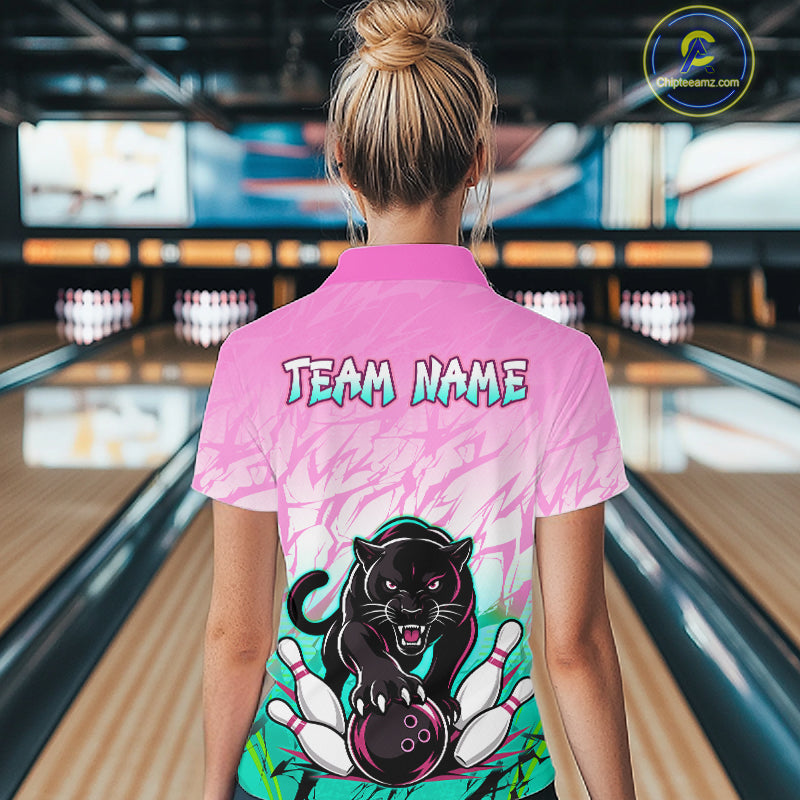 Bowler wearing custom pink and turquoise leopard bowling shirt on the lanes
