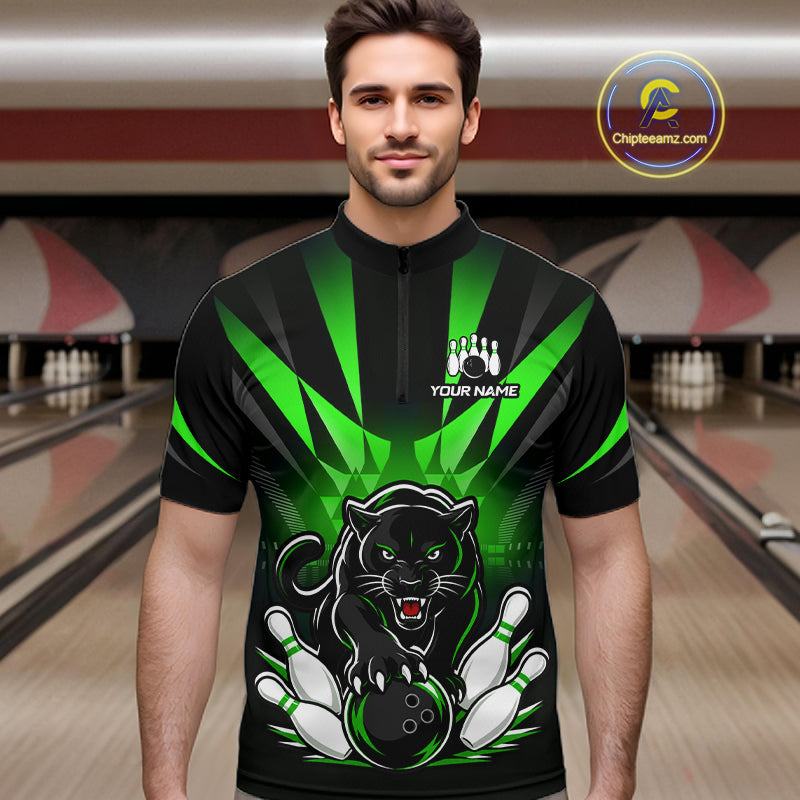 Bowler wearing custom black and green leopard bowling quarter zip team jersey on the lanes