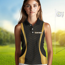 Load image into Gallery viewer, Golfer wearing Custom Skull womens sleeveless golf polo shirt black gold personalized golf gift for men on the golf course