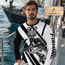 Load image into Gallery viewer, Angler wearing black and white largemouth bass long sleeve fishing shirt on boat