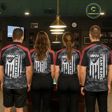 Load image into Gallery viewer, Back view of pool players wearing matching grey camo billiard shirts in a game room.