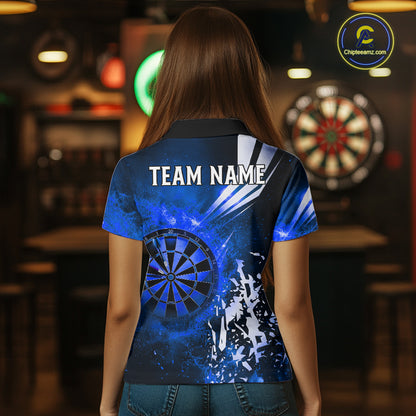 Back view of woman wearing a blue fire dartboard darts shirt.