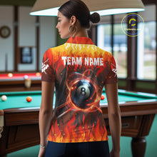 Load image into Gallery viewer, Back view of woman wearing a red 8 ball fire flame pool shirt in a billiards hall.