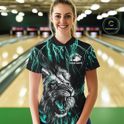 Woman wearing a black and turquoise thunder lightning lion quarter zip bowling shirt front view, personalized bowling team apparel.