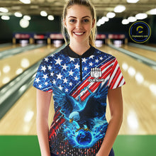 Load image into Gallery viewer, Woman wearing an American flag quarter - zip shirt with an eagle design in a bowling alley, holding a bowling ball.