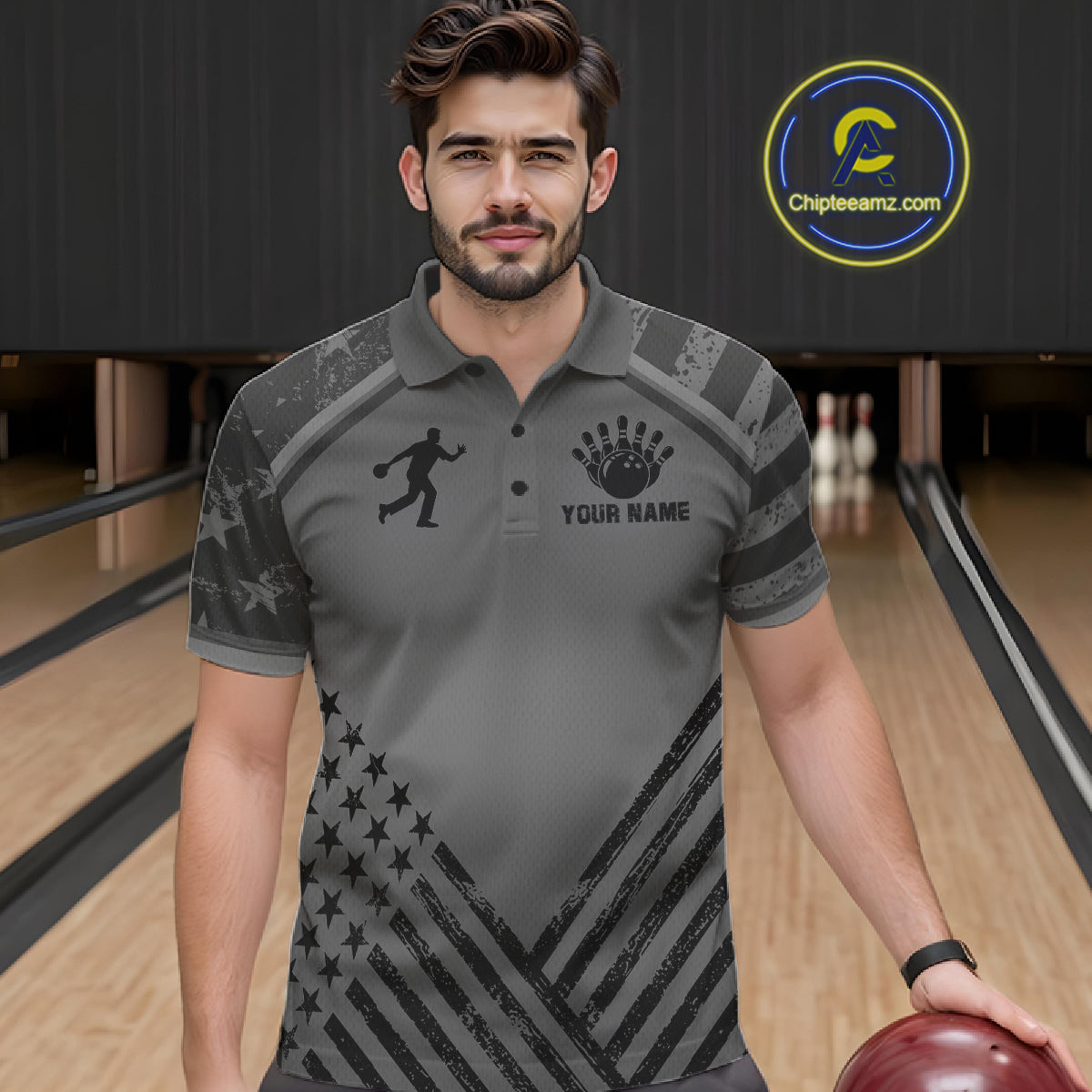 Man wearing a grey American flag bowling polo shirt at a bowling alley front view.