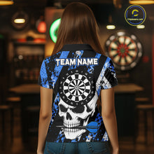 Load image into Gallery viewer, Back view of woman wearing a blue camo skull darts shirt during league play.