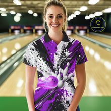 Load image into Gallery viewer, Woman wearing a purple splatter bowling polo shirt at a bowling alley front view.
