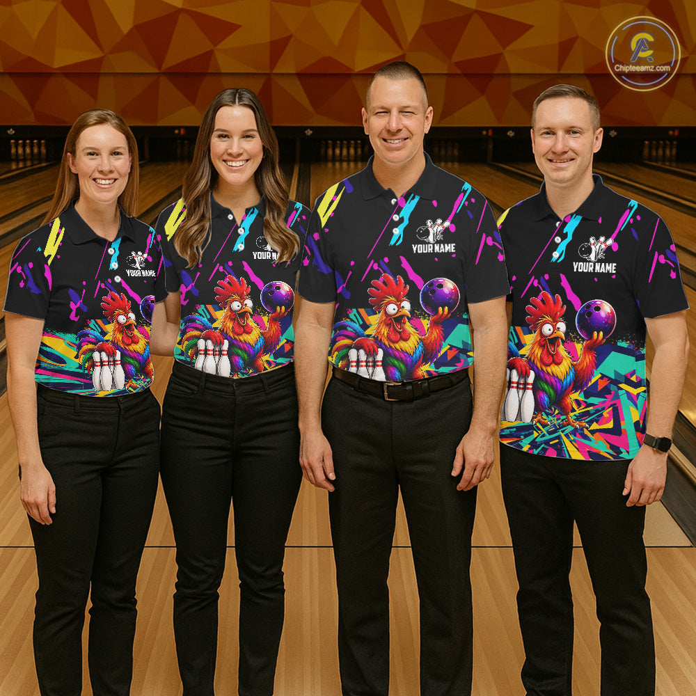 Four people wearing matching bowling-themed shirts with  chicken graphic in a bowling alley.