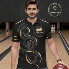 Load image into Gallery viewer, Man wearing a black and gold crown bowling ball polo shirt at a bowling alley front view.