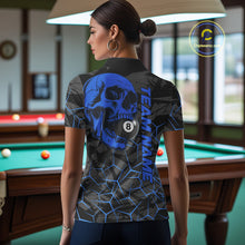 Load image into Gallery viewer, Back view of woman wearing a blue skull pool team shirt in a billiards hall.