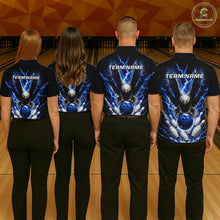 Load image into Gallery viewer, Back view of bowling team wearing matching blue eagle bowling shirts in a bowling alley.