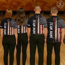 Load image into Gallery viewer, Back view of bowling team wearing matching patriotic bowling shirts in a bowling alley.