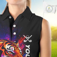 Load image into Gallery viewer, Female golfer wearing colorful tiger golf polo shirt, artistic splatter golf apparel, ladies golf outfit