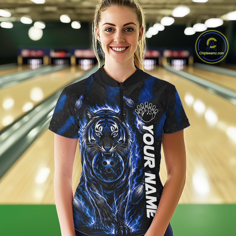 Female bowler wearing Fire Flame Tiger Blue Claws bowling jersey in competitive bowling tournament